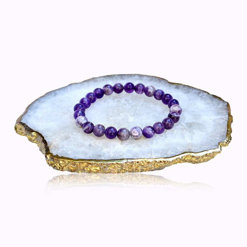 Ribboned Amethyst Bracelet Handmade Ribboned Amethyst bracelet with white and violet 8 mm gemstone beads